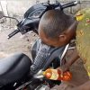 Nigerian man using Palm Oil as engine lubricant