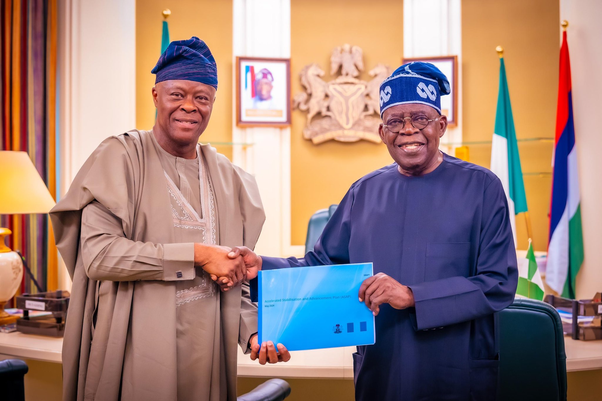 President Bola Tinubu with Minister of Finance, Wale Edun, druing the presentation of an economic stabilisation plan developed by EMT Emergency Taskforce to the President